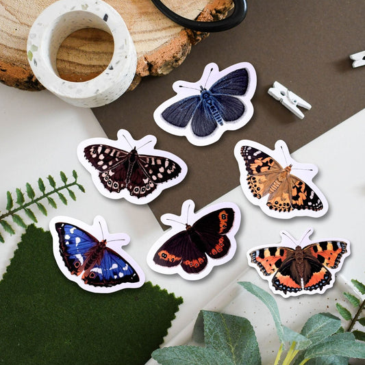 Butterfly stickers on a surface with natural elements