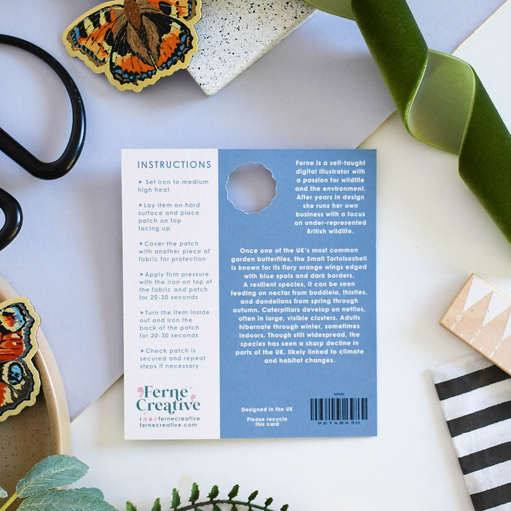 Butterfly-themed product with a label on a decorative background