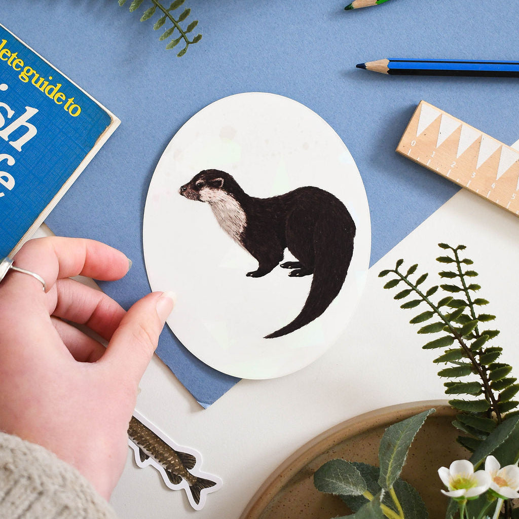 Eurasian Otter rainbow suncatcher decal on blue background 
